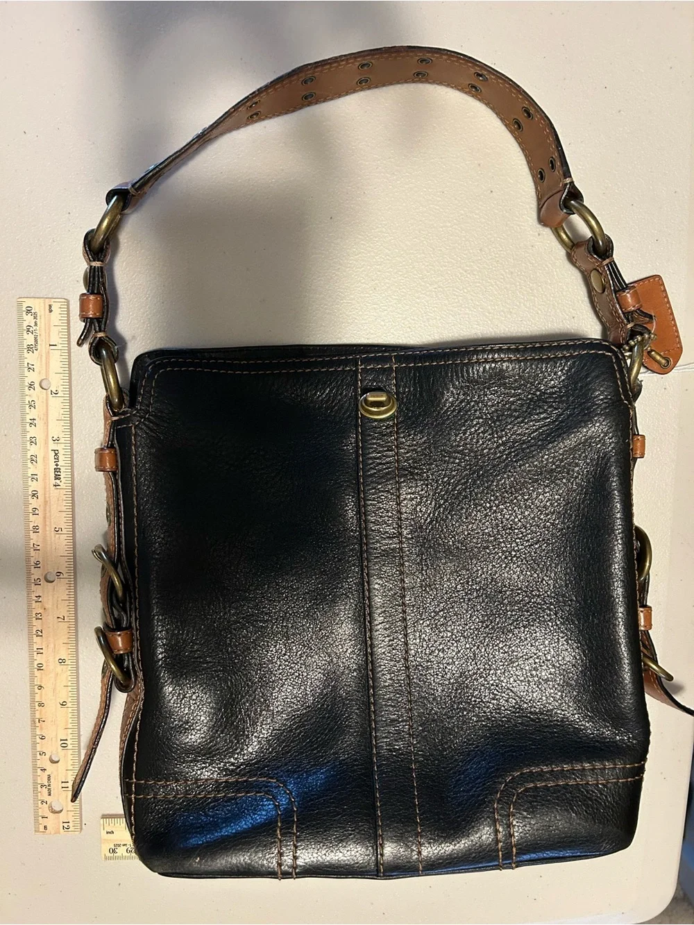 Coach sleek black